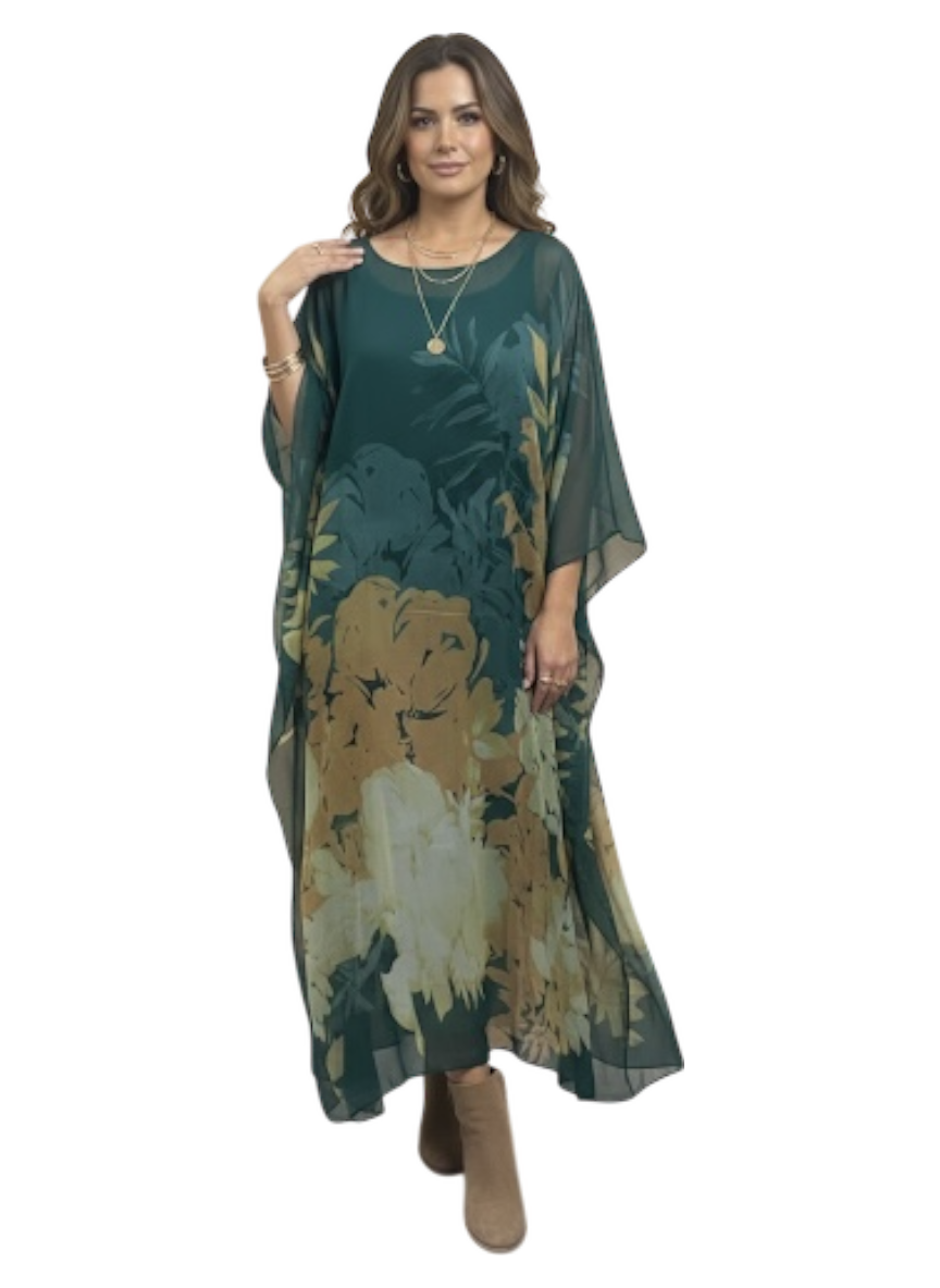 Woman wearing a green floral dress on a white background