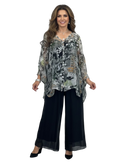 Woman wearing a patterned top and black pants on a white background